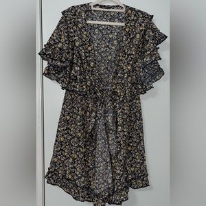 Floral Shein Curve romper, size 3x, never worn, but Shein doesn’t come with tags